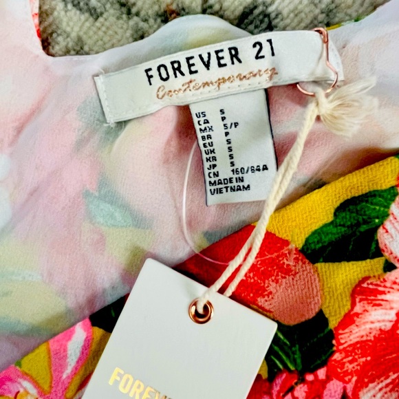 Summer Ready Sleeveless Calf-length wrap around dress. Never worn NWT! - Picture 5 of 7